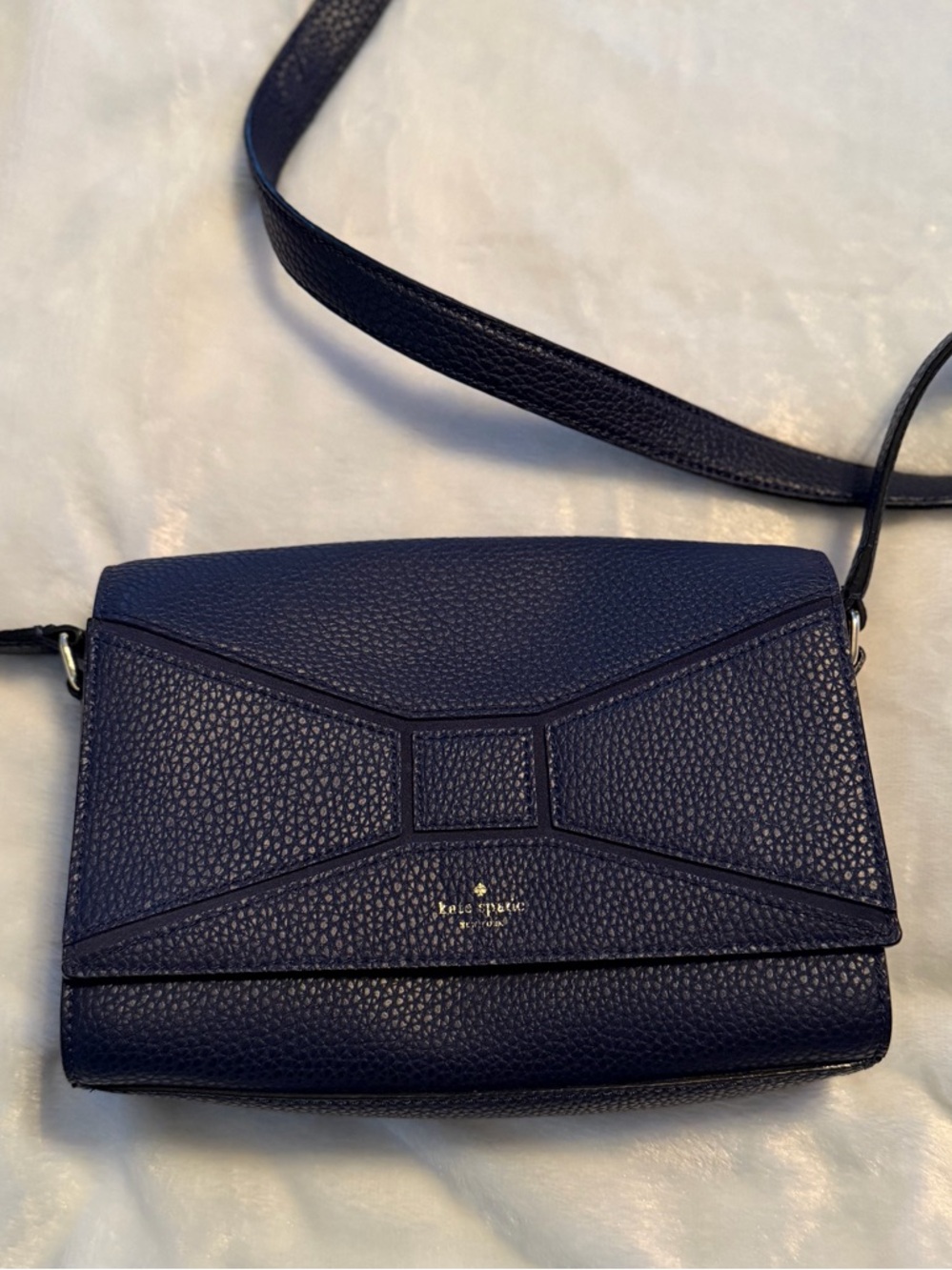 kate spade pebbled navy leather crossbody with bow detail